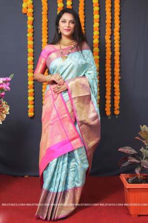 Pattu Weaving Golden Zari Teal Silk Saree 